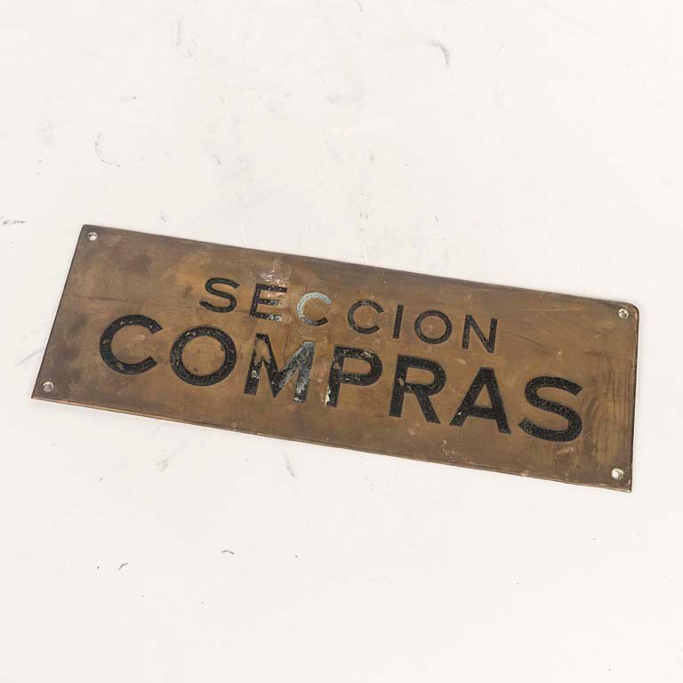 Cartel Antiguo de Chapa Bronce "Sección Compras" - 32 x 10.5 cm