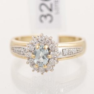 Anillo Oro 18k Combinado con Piedra Celeste y Circonias - imagen 1