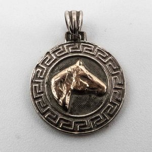 Lote anterior: Dije "Caballo" en Plata y Oro Double