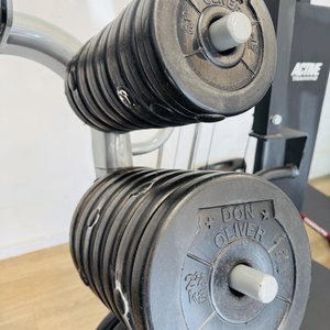 Soporte Body-Solid para discos de gimnasio con 20 discos de 5 kg, 28 de 2.5 kg y 16 de 1 kg - imagen 4