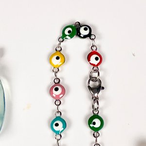 Lote de Cuatro Piezas de Joyería: Pulsera, Caravanas y Colgantes - imagen 6