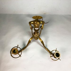 Aplique de Pared en Bronce con Figura de Niño Sosteniendo Luces - imagen 4