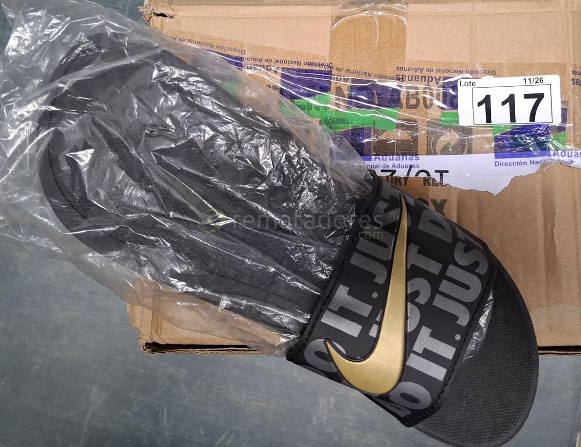 Ojotas Nike Just Do It Doradas y Negras