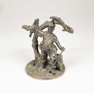 Lote siguiente: Figura de Bronce: Cazador con Perro y Presa