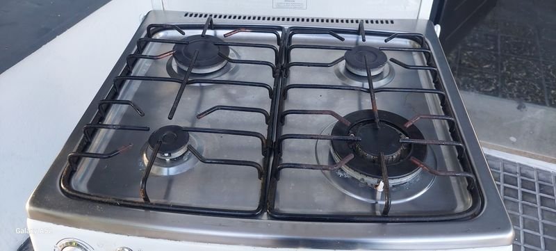 Cocina de gas con horno y ventillo en excelente estado - imagen 7