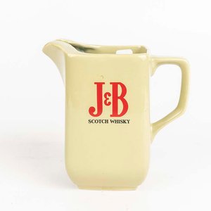 Lote anterior: Jarra de loza inglesa con publicidad de whisky JyB