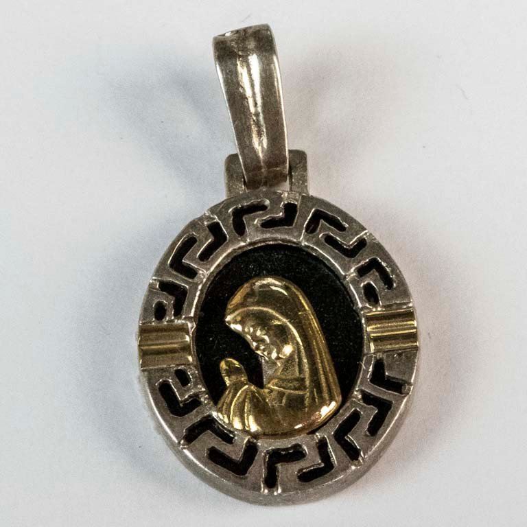 Lote anterior: Pendiente de plata y oro con diseño de mujer