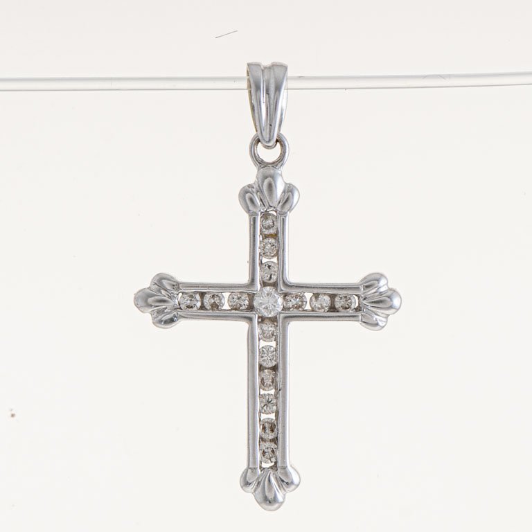 Lote anterior: Cruz de oro 18k con brillantes