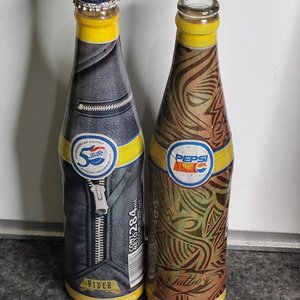 Lote siguiente: Dos Botellas Pepsi Edición Limitada 50 Años: Rider y Tattoo