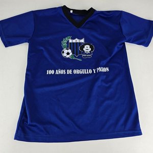 2 Camisetas de Fútbol Vintage: Quilmes y "100 Años de Orgullo y Pasión" - imagen 2