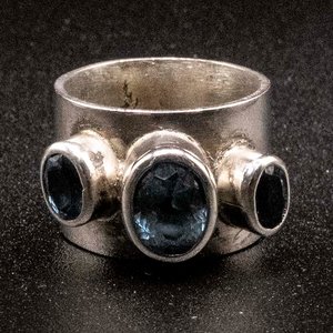 Lote siguiente: Anillo de Plata 950 con Topacios Azules