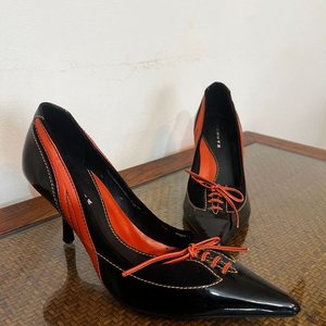 Lote anterior: Zapatos Schütz Charol Negro y Naranja Taco Aguja Talle 38