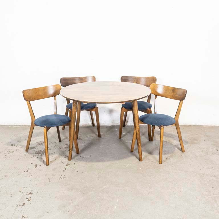 Lote anterior: Mesa de comedor circular con cuatro sillas azules