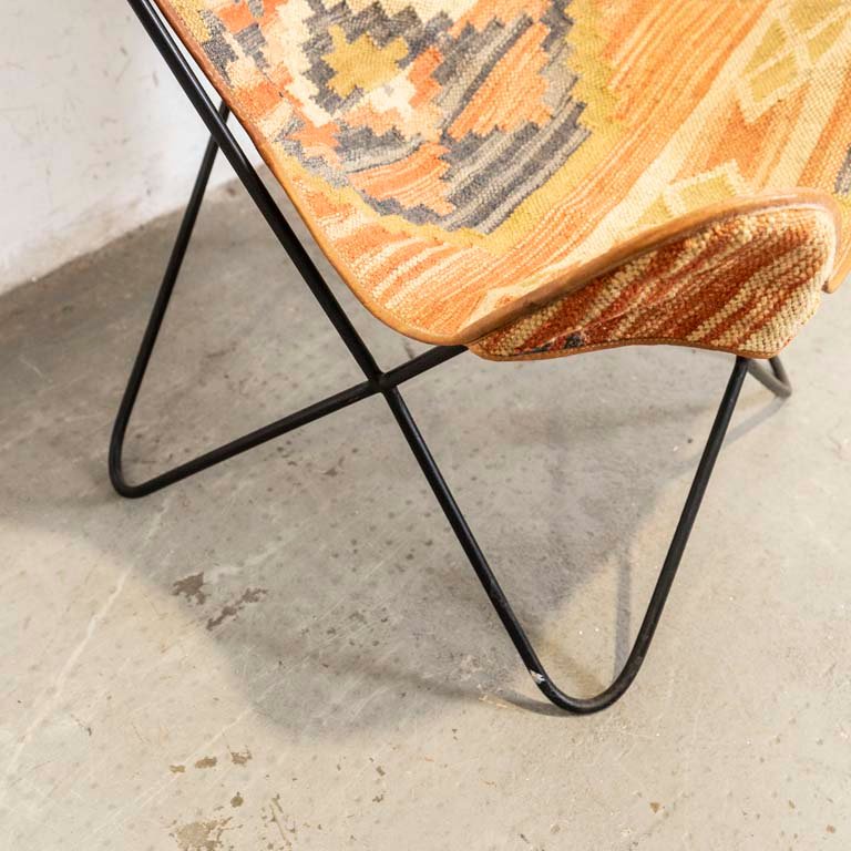 Sillón africano de estructura de hierro y asiento de tela - imagen 3