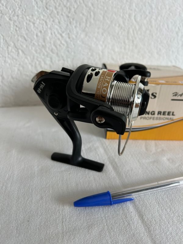 Reel de pesca nuevo en excelente condición - imagen 4