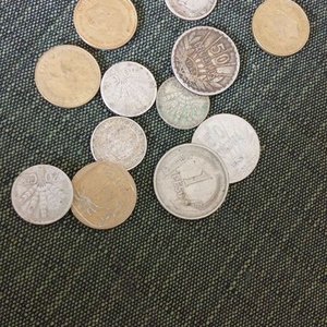 Lote siguiente: Latita Antigua con Monedas de Plata y Bronce