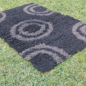 Lote anterior: Alfombra Negra con Diseño de Círculos