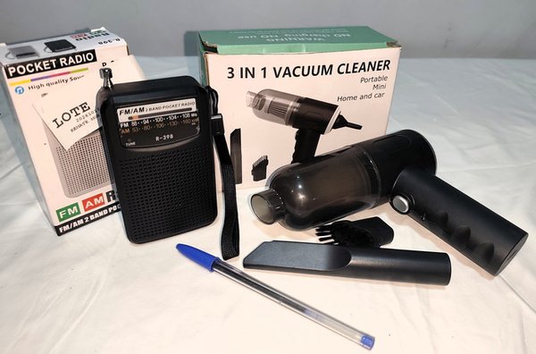 Radio Portátil AM/FM a Pilas Nueva en Caja y Aspiradora Portátil Mini