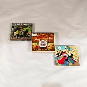Lote siguiente: Tres discos de rock originales: La Triple Nelson y La Vela Puerca
