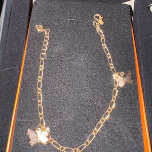 Lote anterior: Pulsera Dorada con Diseños de Mariposas y Flores