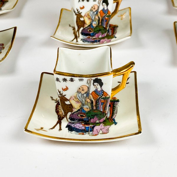 Juego de porcelana oriental para café, quince piezas decoradas personajes - imagen 2