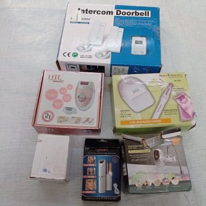 Seis piezas: depiladora femenina, torno para uñas, portero eléctrico, calentador de agua instantáneo para canilla y otros. - imagen 3