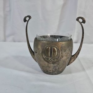 Lote anterior: Adorno de Peltre y Cristal con Asas