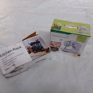 Lote anterior: Dos piezas: organizador para condimentos cocina y  maquina para coser