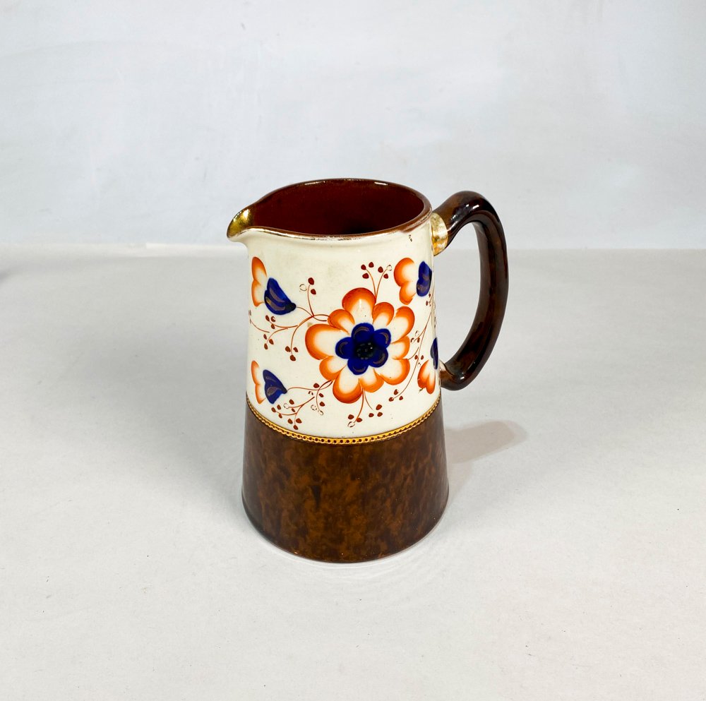 Lote siguiente: Jarra decorativa floral marrón y blanco