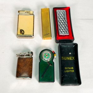 Lote siguiente: Cinco Encendedores Antiguos de Colección
