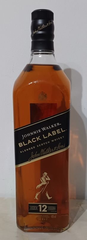 Lote siguiente: Botella de Whisky Johnnie Walker BLACK LABEL 12 Años