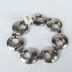 Lote anterior: Pulsera de Plata con Diseño de Anillos