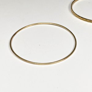 Tres Pulseras Doradas Estilo Esclava - imagen 4