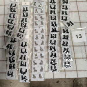 Lote siguiente: Lote de 13 Paquetes de Aros y Clips para Orejas de Acero Inoxidable