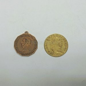 Lote siguiente: Medalla y Moneda Antigua de Colección