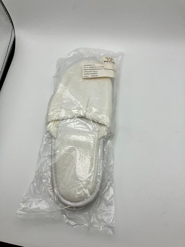 Lote de Pantuflas Blancas de Hotel Nuevas