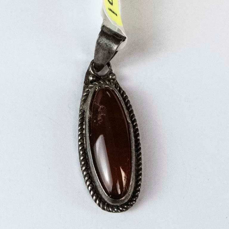 Lote siguiente: Dije de plata con piedra - Accesorio de moda