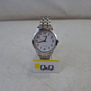 Lote siguiente: Reloj Pulsera Q&Q Blanco con Números Arábigos Plateados