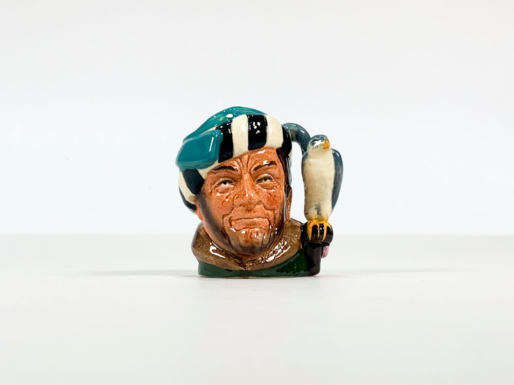 Lote siguiente: Royal Doulton jarra con motivo El Falconer