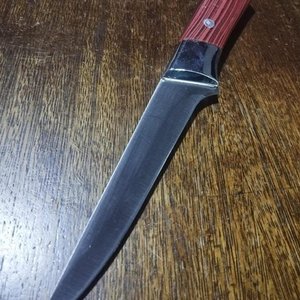 Lote anterior: Cuchillo de Chef con Mango de Madera y Hoja Afilada