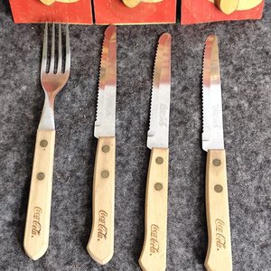 Lote anterior: Set de 7 Cubiertos Coca Cola con Mango de Madera
