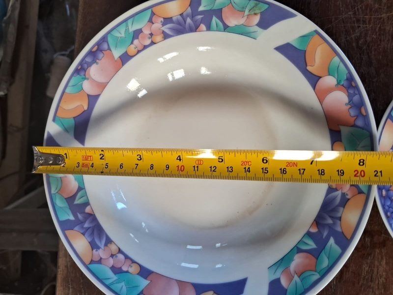 Juego de platos y platillos cerámicos con patrón floral - imagen 5