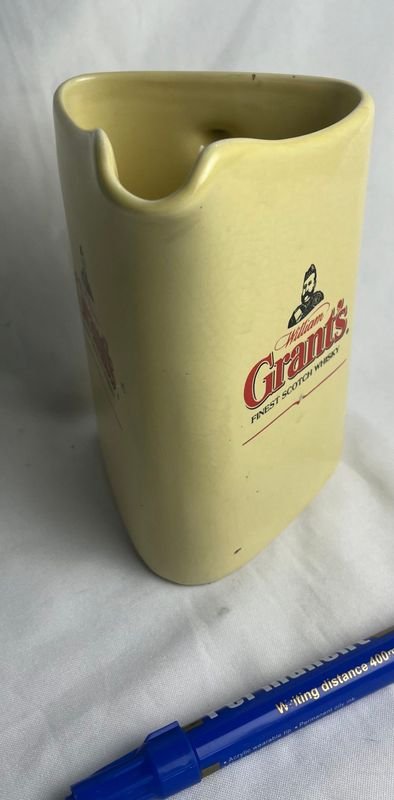 Jarra loza de porcelana amarilla con diseño colorido - imagen 9