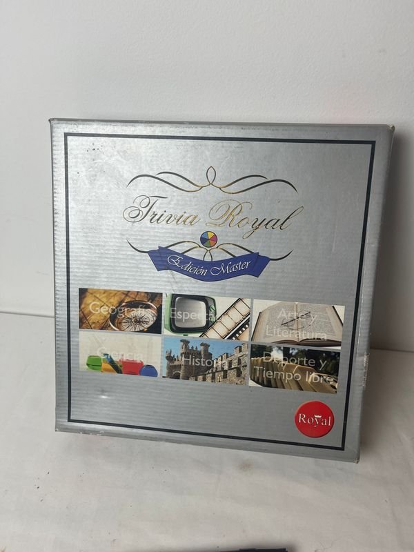 Lote siguiente: Juego Trivial: Un Juego de Conocimiento y Diversión