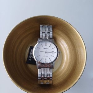 Reloj Orient Cuarzo Acero Inoxidable Esfera Blanca con Fecha - imagen 2