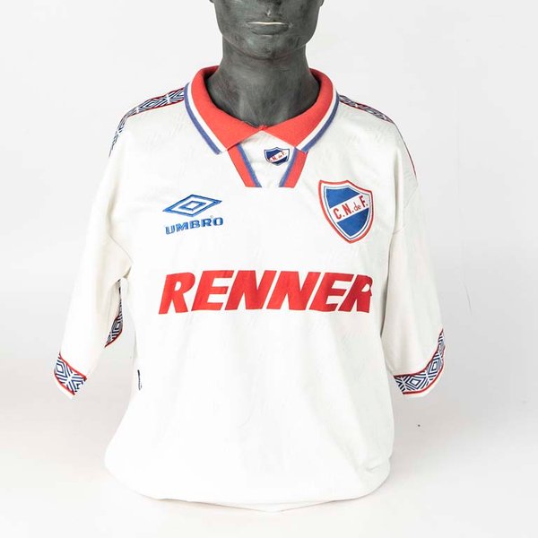 Lote siguiente: Camiseta de Nacional oficial de tienfa marca UMBRO sin número modelo de los años 1996/97