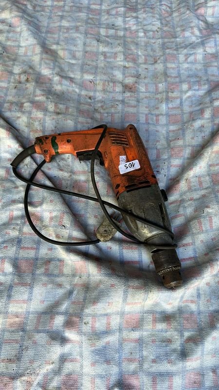 Lote anterior: Taladro eléctrico naranja con cable negro