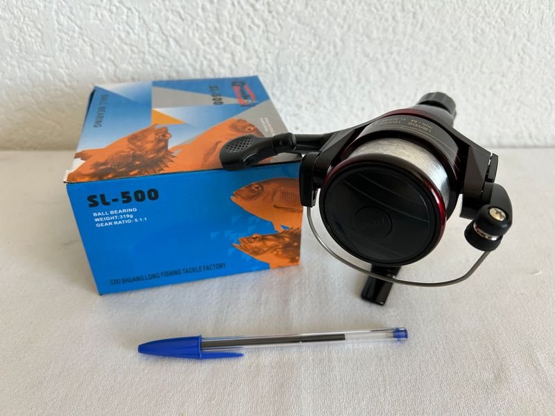 Reel de pesca nuevo y accesorios - imagen 4