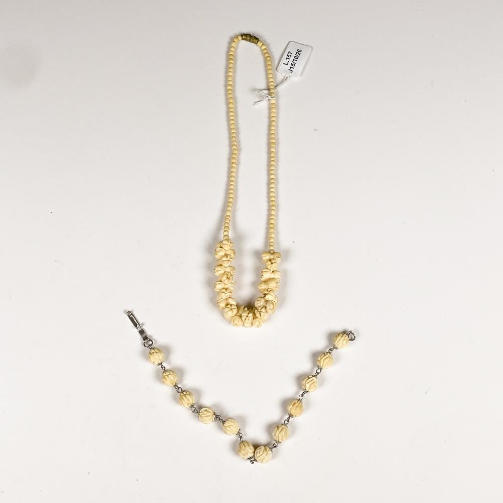 Conjunto de Collar y Pulsera de Marfil Tallado