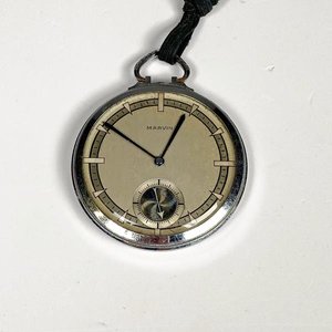 Lote siguiente: Reloj de Bolsillo Marvin Caja de Metal